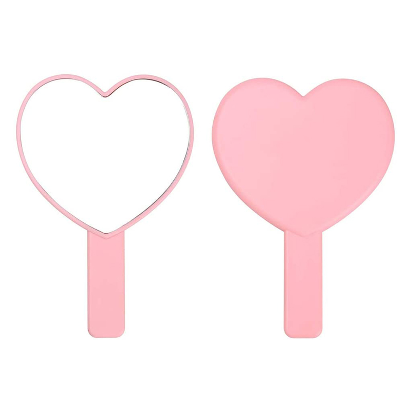 Miroir à main rose décoratif en forme de cœur